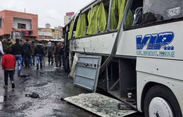 Twin blasts in Damascus kill about 40 Iraqis, wound 120
