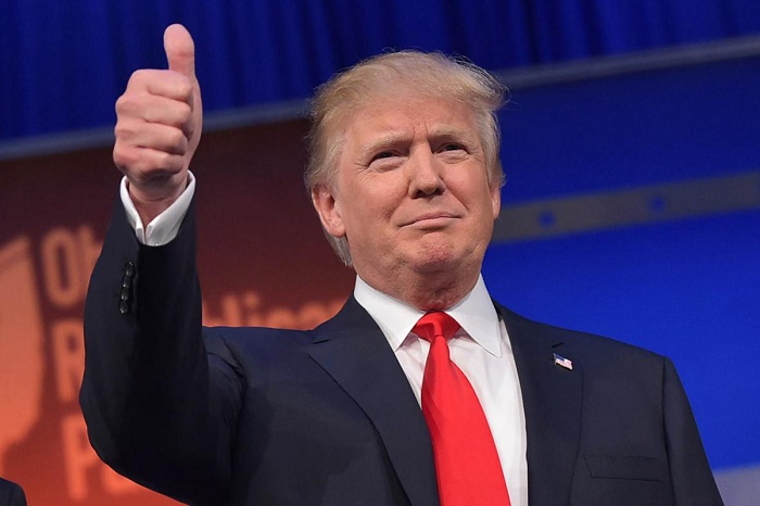 Trump calls Obama `a very good man` after historic White House meeting