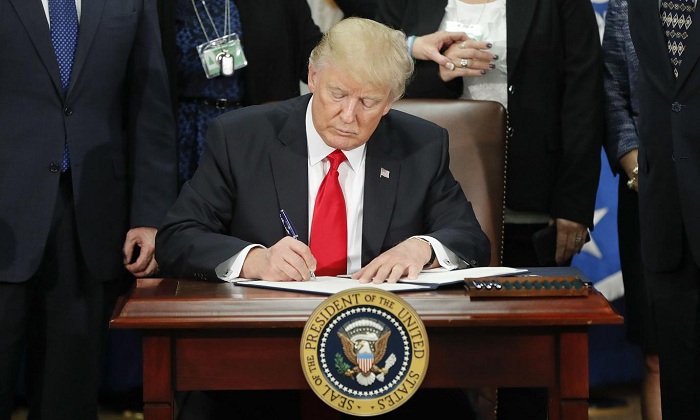 Trump adopts aggressive posture toward Iran after missile launch