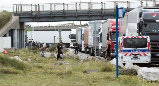 About 30 migrants found in refrigerator truck in French City of Dunkirk