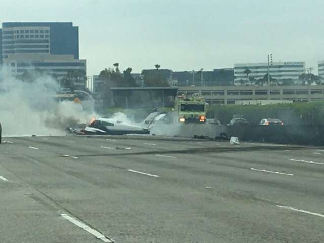 Small plane crashes onto California freeway