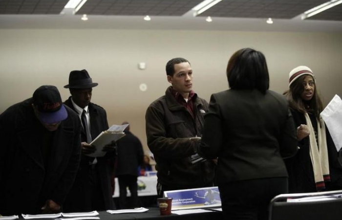 U.S. jobless claims fall as labor market tightens
