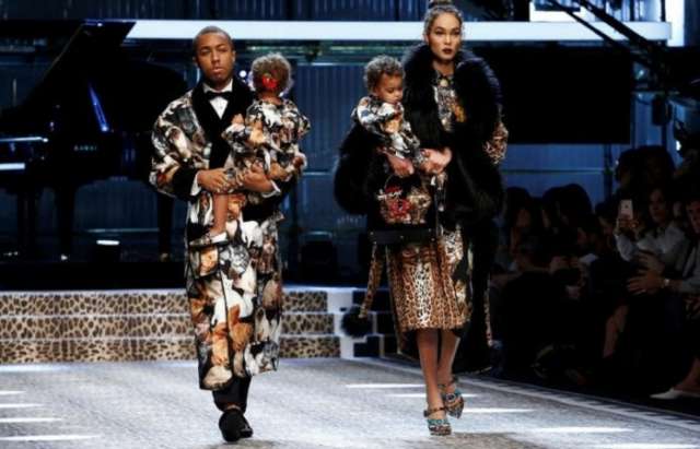 Families walk down the catwalk at Dolce & Gabbana's Milan show
