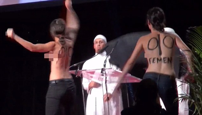 Topless women BEATEN for feminist protest at Muslim event-VIDEO