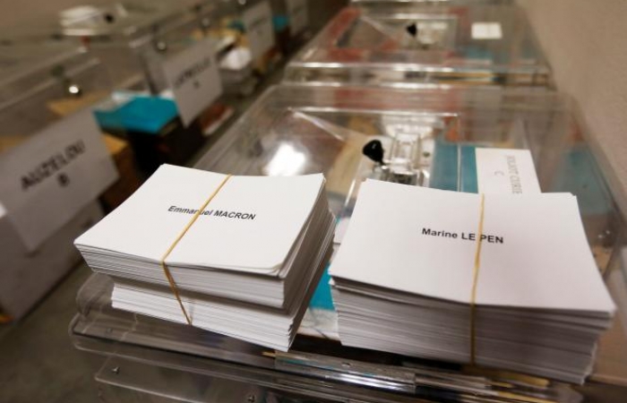 France fights to keep Macron email hack from distorting election