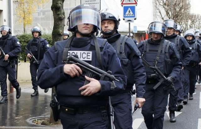 French police arrested nine, detained 141 protesters in Paris on election night
