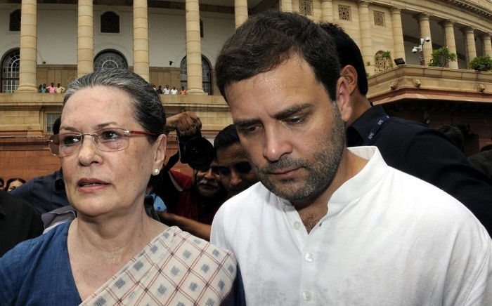  India`s Sonia Gandhi, son Rahul appear at court for corruption case