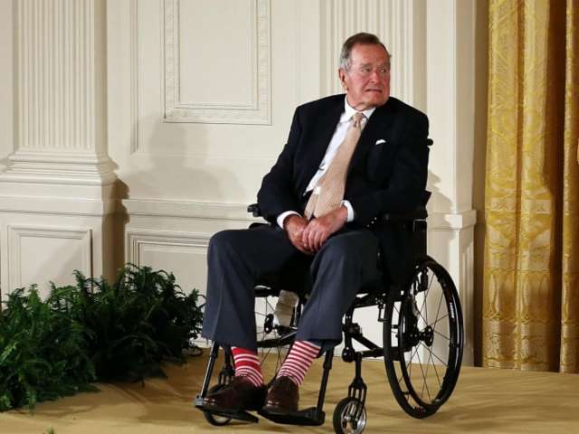 George HW Bush accused by second woman of sexual assault from his wheelchair