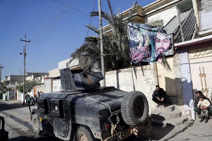 Iraq truck bomb kills 57 - mostly Iranian Shi`ite pilgrims, authorities say