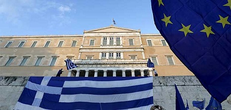 Eurozone ministers strike deal to release funds to Greece