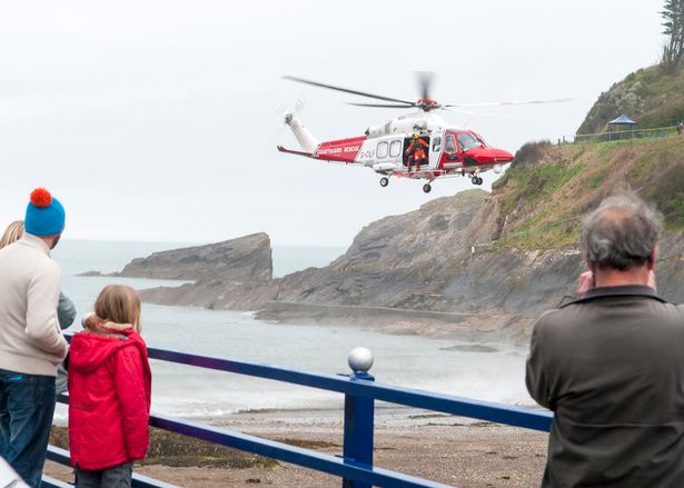 Teen boy saved from 50ft cliff in dramatic rescue in this helicopter footage