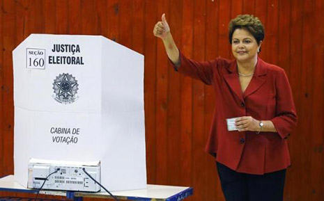 Rousseff pledges changes after narrow re-election win, markets fall