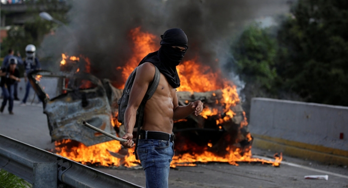 إصابات بعد تفريق مظاهرة معارضة بفنزويلا