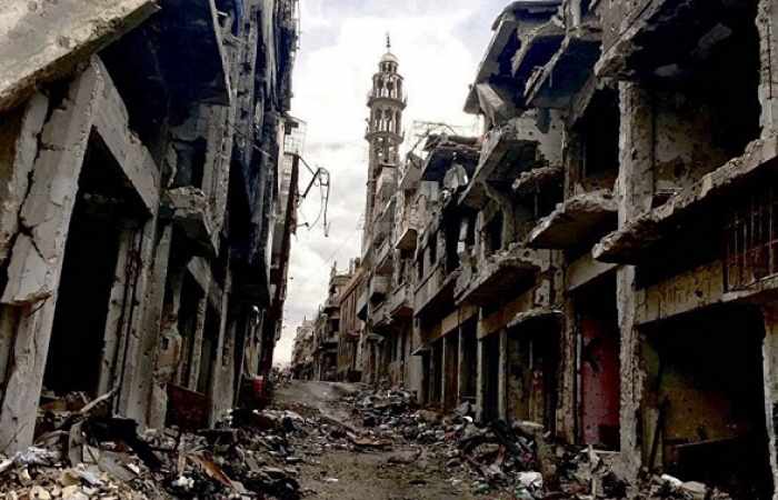 La evacuación del barrio Al Waer de la ciudad siria de HomsPrimer grupo de combatientes y civiles abandona Homs