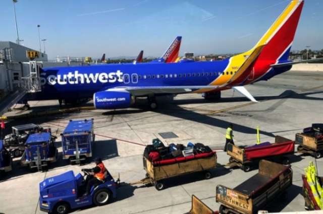 US passenger 'tried to open door' mid-flight to Houston