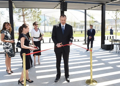 President Ilham Aliyev, his spouse review newly-built park in front of European Games Park