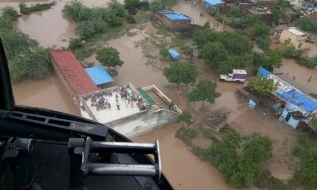 India floods: 213 killed in Gujarat as receding waters reveal more victims