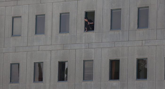 One of Iranian parliament attackers blows himself up inside the building
