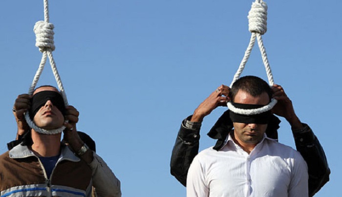Iran publicly hangs drug smuggler & police killer