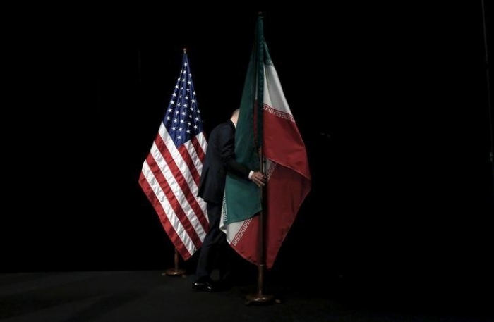 Iran says new U.S. sanctions violate nuclear deal, vows "proportional reaction"