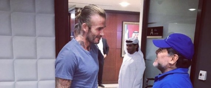 اللاعب الإنكليزي ديفيد بيكهام يلتقي مارادونا في مدينة عربية