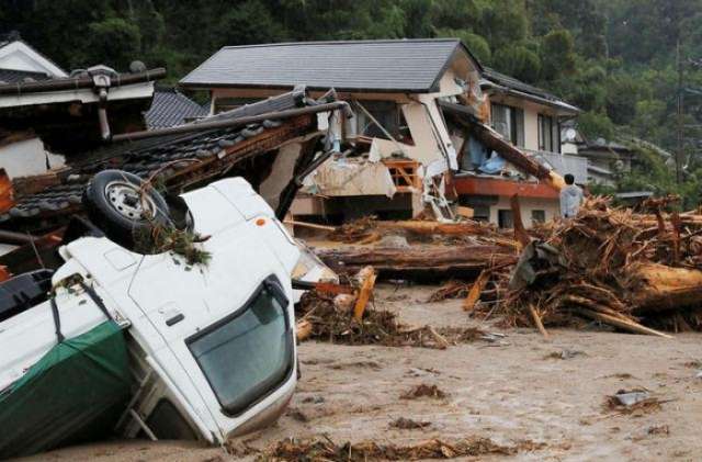 At least three hurt, 11 missing as heavy rain pounds Japan