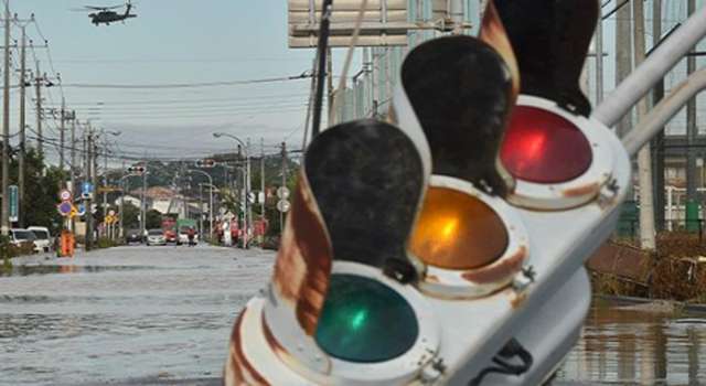  Thousands of rescuers deployed as Japan floods kill 3 and leave 25 people missing