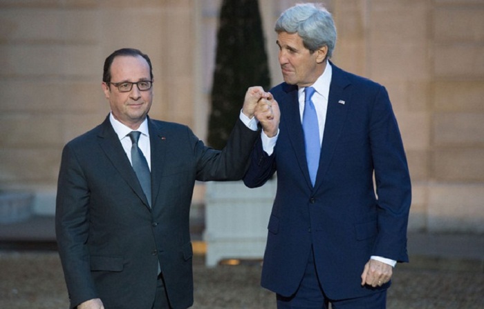 «Accord contraignant» à la COP21: François Hollande recadre John Kerry