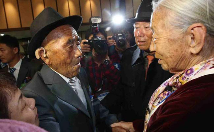 Reunited after 65 years, Korean families let tears speak for themselves