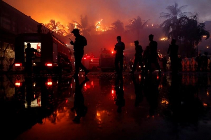 Fire destroys landmark hotel in Myanmar's largest city, kills one