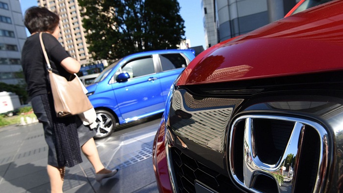 Honda rappelle plus de 20 millions d`airbags Takata, ses bénéfices en forte chute