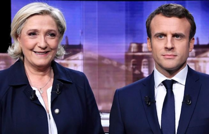 Marine Le Pen and Emmanuel Macron trade insults in TV debate