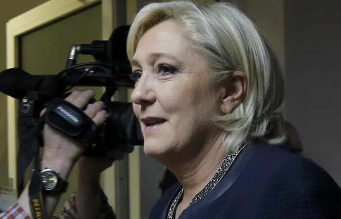Putin meets France's Le Pen in Moscow, says won't interfere in election