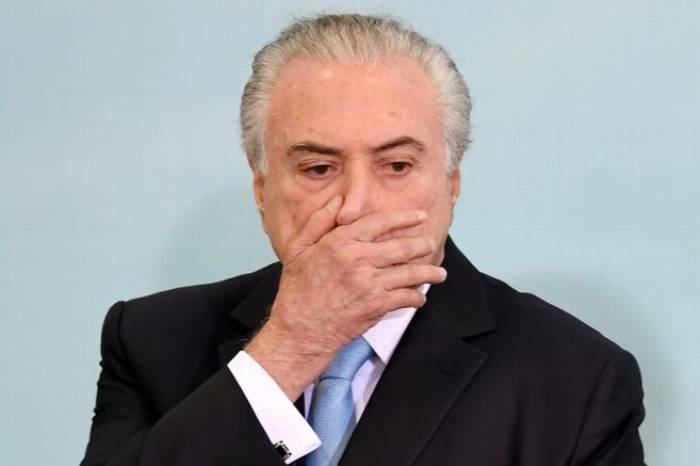 Brésil: Temer sauve son poste sur le fil