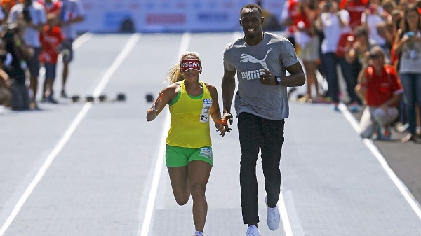 Jeux paralympiques: Bolt, guide d`une athlète malvoyante? Rien ne l`en empêche
