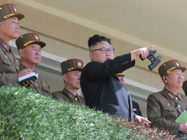 North Korea’s Kim celebrates test of ‘perfect weapon system’