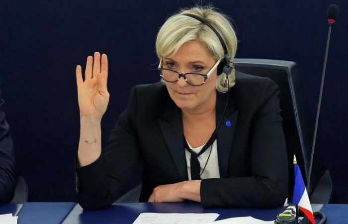 Clashes at French far-right leader Le Pen rally in Corsica