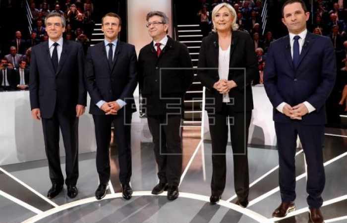 Macron y Le Pen, blanco de los ataques en un primer debate vivo y tenso