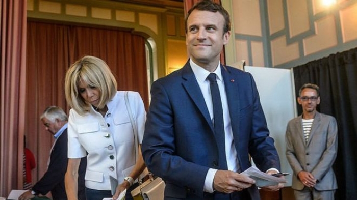 Macron’s party headed for commanding position in French election
