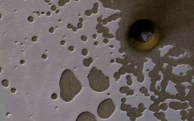 NASA can't explain what made this strange, deep hole on Mars