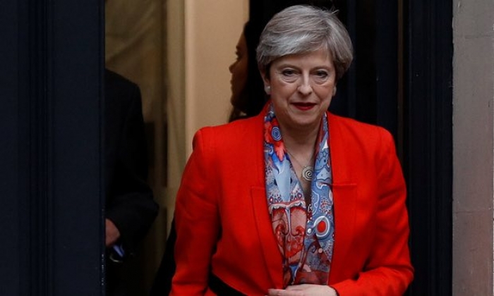 May reaches deal with DUP to form government after shock election result