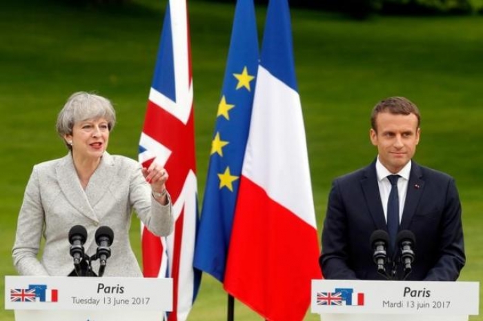 Britain, France to sign new immigration treaty during Macron visit