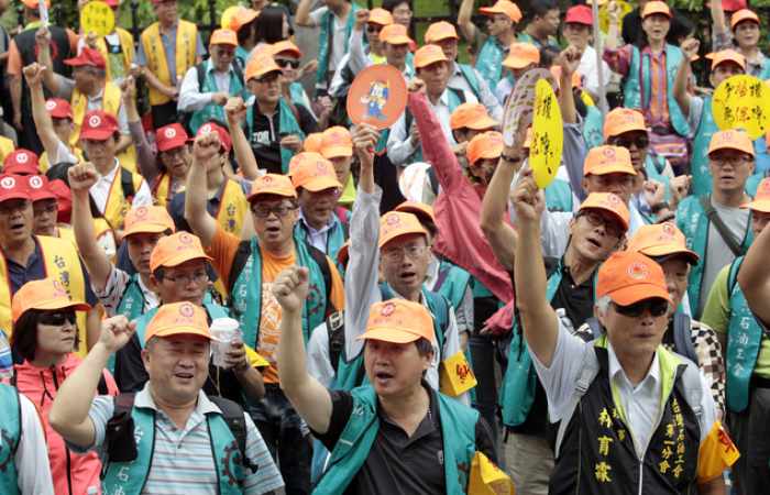 May Day marked with defiant rallies for worker rights 
