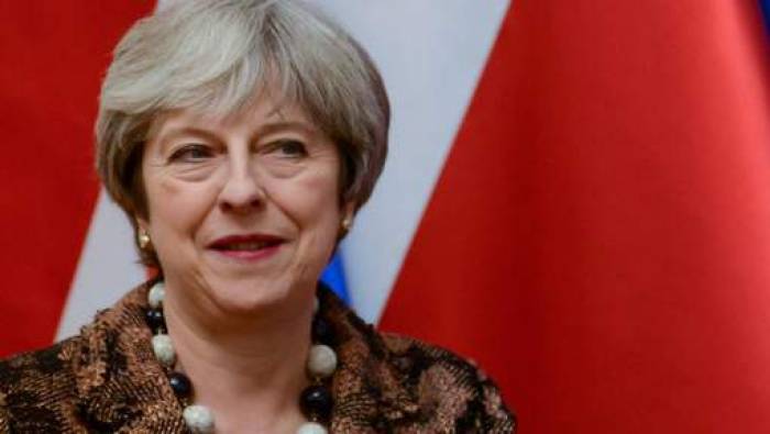 A un an du Brexit, Theresa May veut rassembler les Britanniques