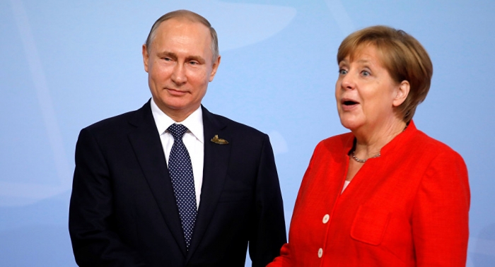 Merkel cordially greets Putin at G20 Summit welcome ceremony