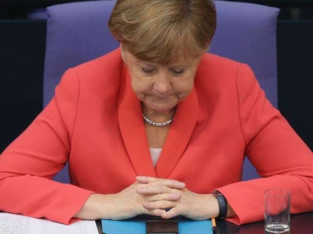 Nearly half of Germans believe Merkel should resign