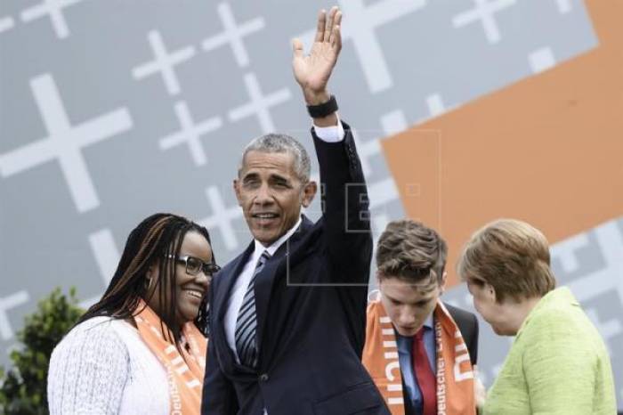 Merkel y Obama reivindican su gestión y llaman al activismo democrático
