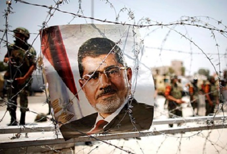 Egyptian court puts ousted president Mursi on trial over Qatar link