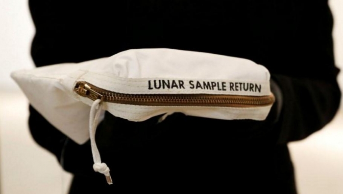 Neil Armstrong's moon bag sells for $1.8 million at auction