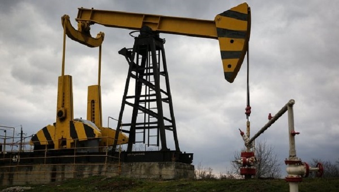 Oil prices edge up as Saudis limit exports to Asia, U.S.
